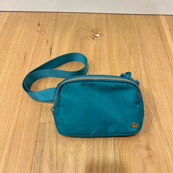The Darling Effect Handbags - THE DARLING EFFECT Teal “All You Need” Belt Bag